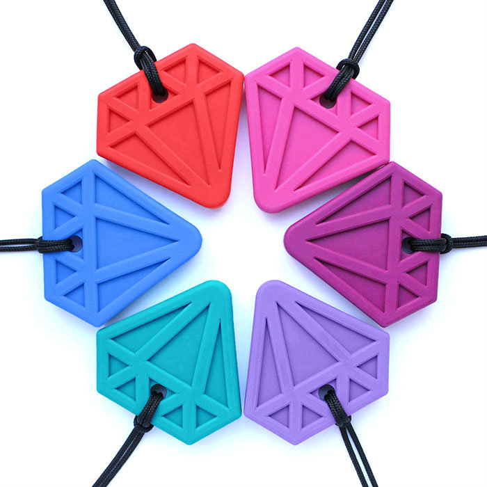 6 colors of the ARK Diamond chew necklace displayed in a circle