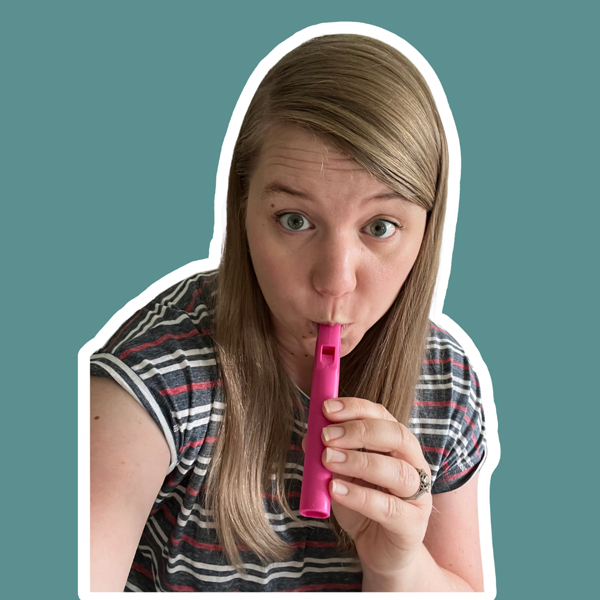Physical Therapist Amber Michelle blowing ARK's Flute Whistle