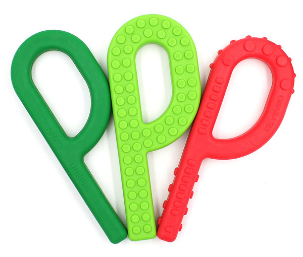 Oral Sensory Stocking Stuffer Ideas The smooth Grabber, Grabber Brick, and Textured Grabber P chews side by side in festive colors