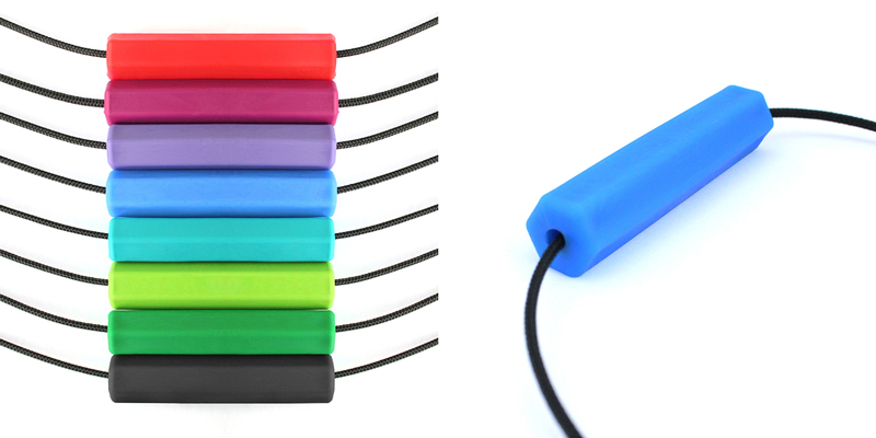 On the left: a stack of various colors of the Krypto-Bite Tube necklace.  On the right: a close-up of the royal blue pendant from the side.