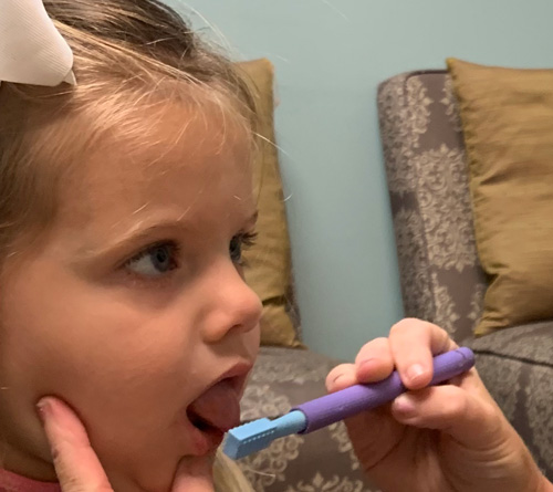 5 Ways to Easily Assess Tongue-Ties Using ONE Simple Tool A therapist uses the Z-Vibe to look for a tongue tie and assess range of motion